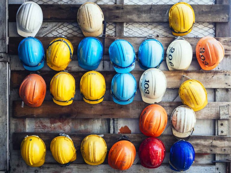 twentyone group recruitment construction jobs hard hats on a wall
